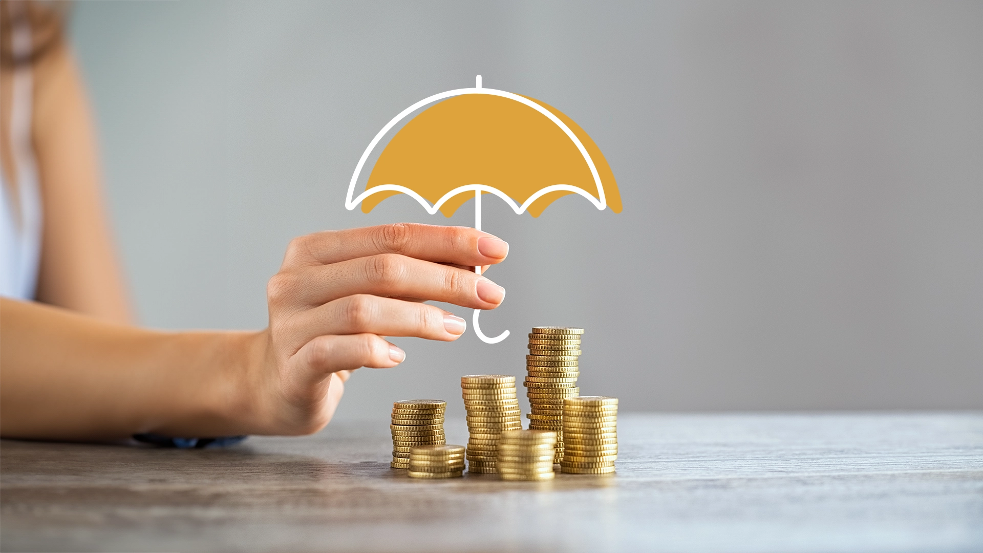 Image d'un parapluie avec des pièce de monnaie